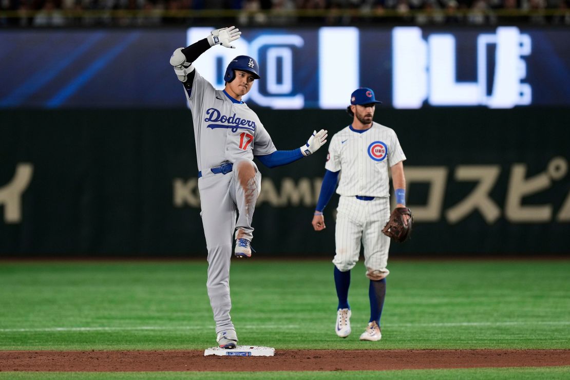 Ohtani celebrates his double in the ninth inning.