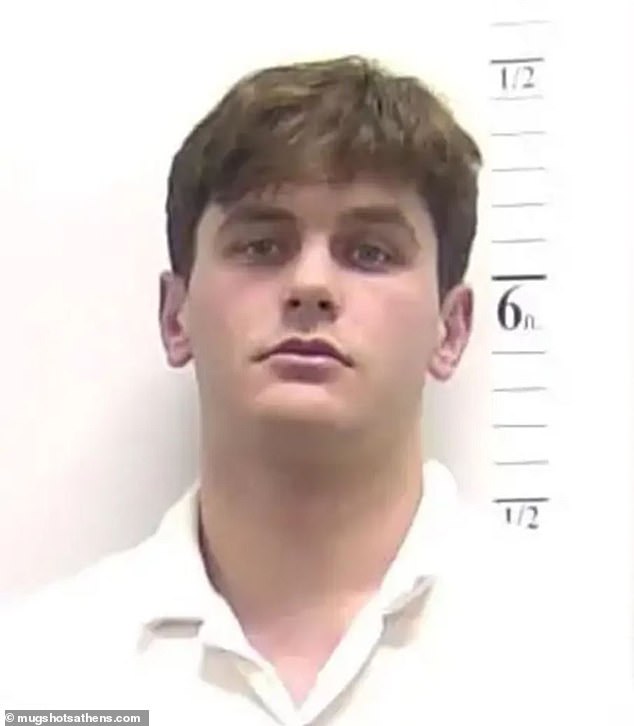 Listed at 6-foot-4 with the Crimson, Gilmartin appeared to be an inch taller in his mugshot