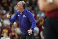 TCU head coach Jamie Dixon directs his players during the first half of an NCAA college...