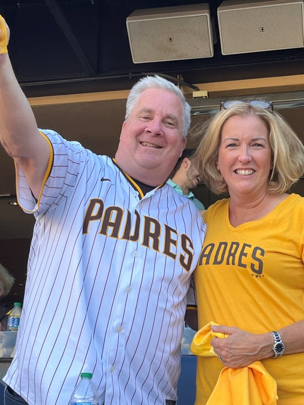 John Seidler and his wife, Laurie, cheer for the Padres during the 2024 postseason. MLB owners approved John Seidler as the Padres' new control person during a Thursday meeting. (San Diego Padres)