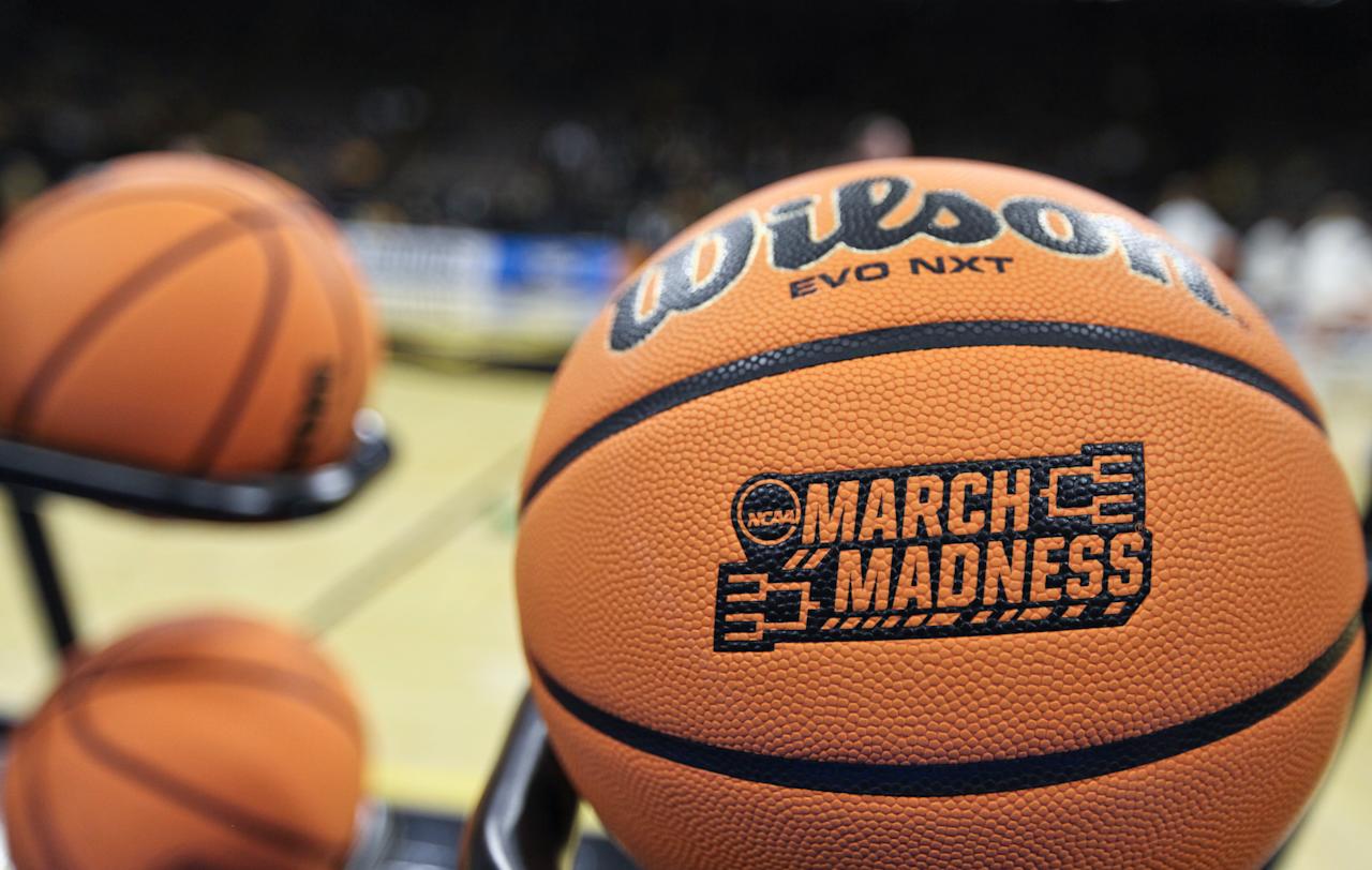 IOWA CITY, IOWA- MARCH 23:  A March Madness logo stamped into the Wilson basketballs used for the match-up between the Iowa Hawkeyes and the Holy Cross Crusaders during first round of the 2024 NCAA Division 1 Womens Basketball Championship at Carver-Hawkeye Arena on March 23, 2024 in Iowa City, Iowa.  (Photo by Matthew Holst/Getty Images)