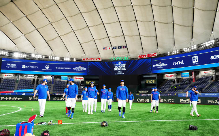 Members of the Chicago Cubs warm-up during the 2025 Tokyo Series workout day.