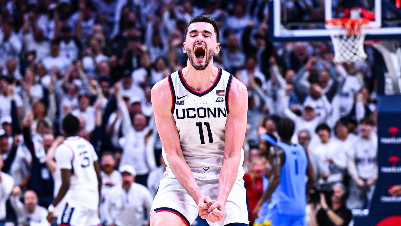 Alex Karaban celebrates after scoring in a March 5, 2025 game against Marquette