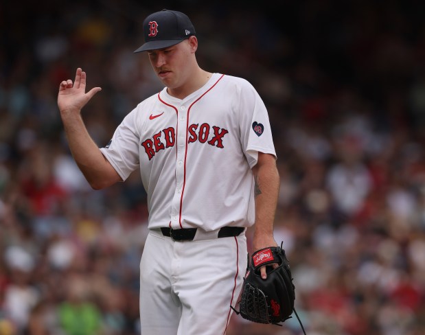 Boston, MA - Boston Red Sox pitcher Josh Winckowski reacts during the 3rd inning of the game at Fenway Park. (Nancy Lane/Boston Herald)