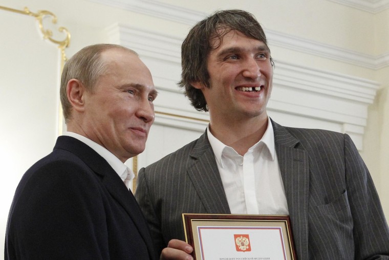 Russian President Vladimir Putin meets with Russian national ice hockey team member Alexander Ovechkin in Moscow after the team's World Championship victory in 2012.