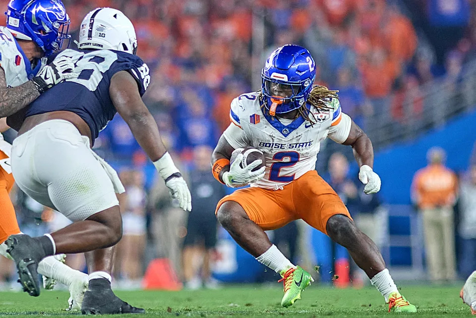 GLENDALE, ARIZONA - DECEMBER 31: Boise State Broncos running back Ashton Jeanty (2) runs with the football in action during the 2024 Vrbo Fiesta Bowl between the Penn State Nittany Lions and Boise State Broncos at State Farm Stadium on December 31, 2024 in Glendale, Arizona. (Photo by Robin Alam/ISI Photos/Getty Images)