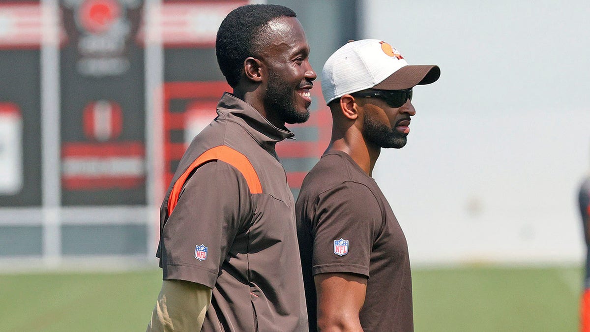 Former Cleveland Browns Vice President of Football Operations Kwesi Adofo-Mensah, left, and current GM Andrew Berry watch over the training camp
