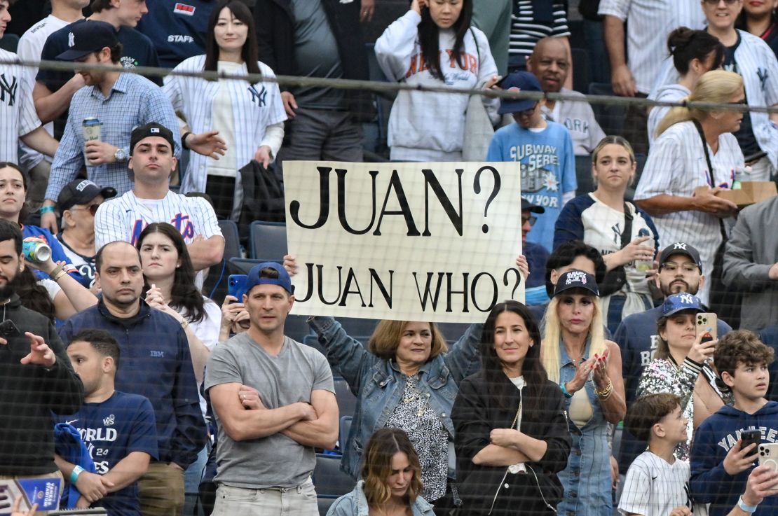 Some fans held up signs in the crowd, others wore T-shirts with profane slogans.