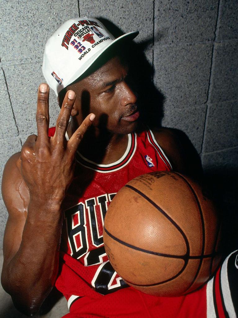 MJ celebrates winning the 1993 NBA Championship. Photo by Andrew D. Bernstein/NBAE via Getty Images