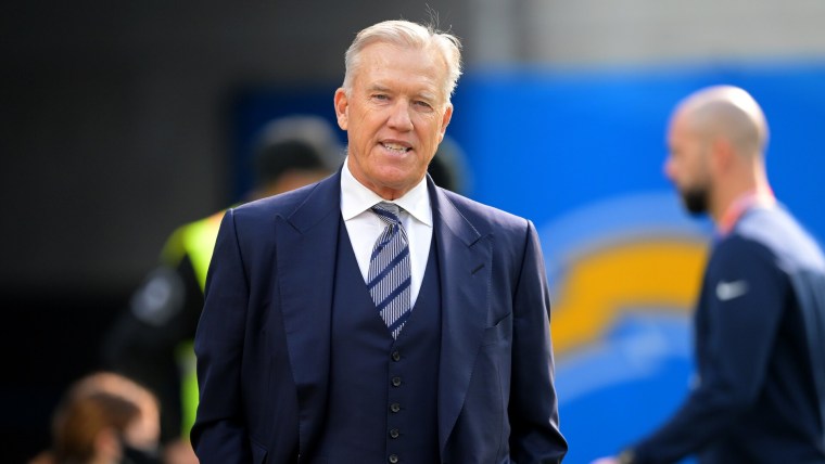 Jan 2, 2022; Inglewood, California, USA; Denver Broncos president of football operations John Elway looks on before the game against the Los Angeles Chargers at SoFi Stadium. Mandatory Credit: Jayne Kamin-Oncea-Imagn Images