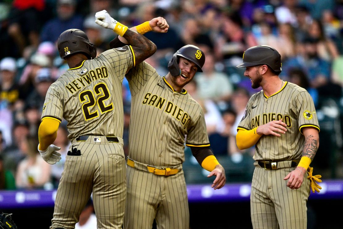 San Diego Padres outfielder Jason Heyward celebrates his fourth inning three-run home run with Gavin Sheets and Jackson Merrill.