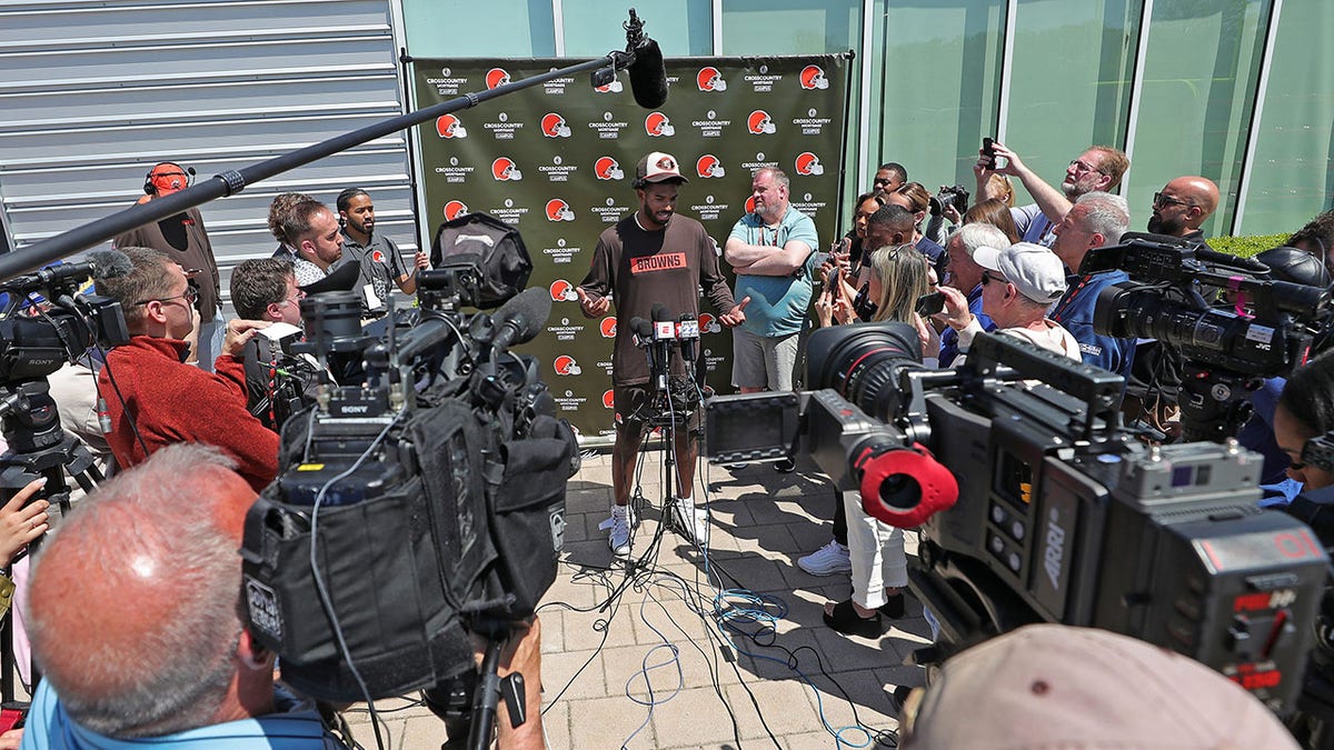 Shedeur Sanders speaks to the media