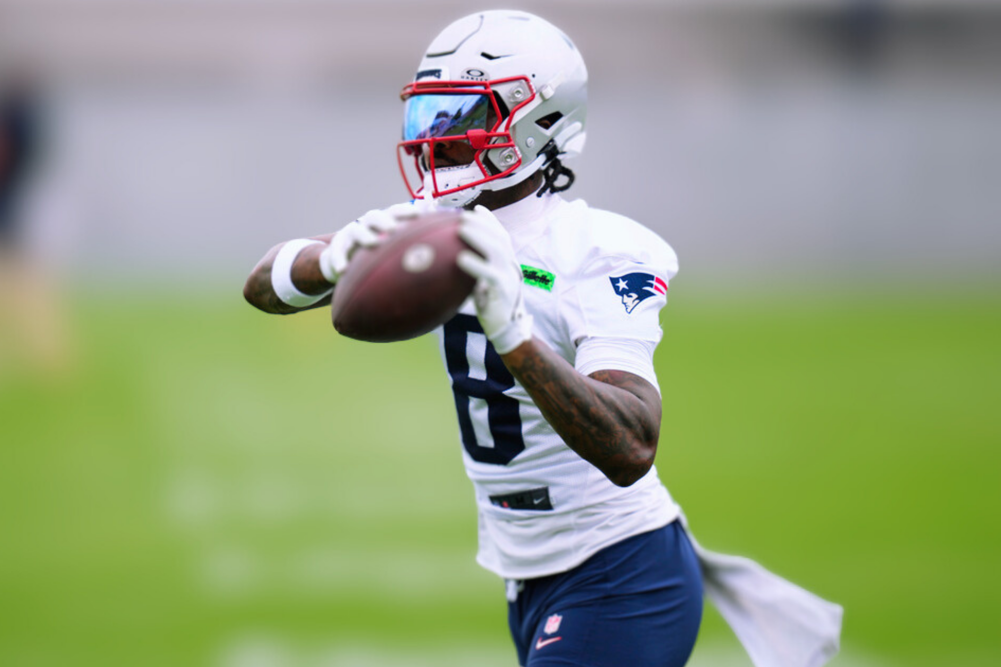 New England Patriots wide receiver Stefon Diggs catches a pass during an NFL football practice.