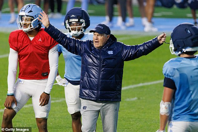 Head coach Bill Belichick of the North Carolina Tar Heels coaches during North Carolina's