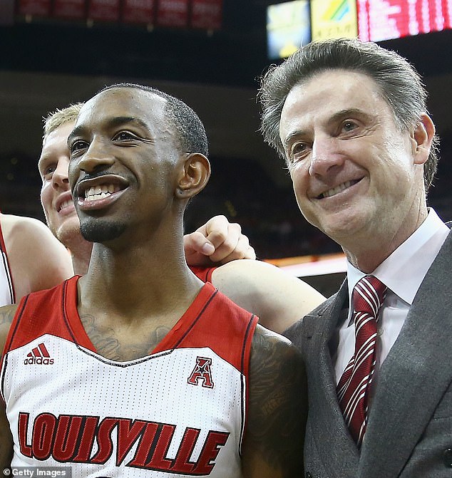 Russ Smith is seen with then-Louisville coach Rick Pitino after a 2014 win over Connecticut