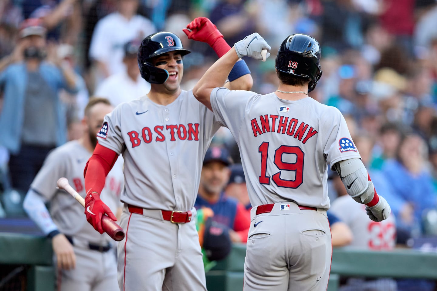 Among the first teammates to congratulate Roman Anthony (right) on hitting his first career home run on Monday night was fellow rookie Marcelo Mayer.