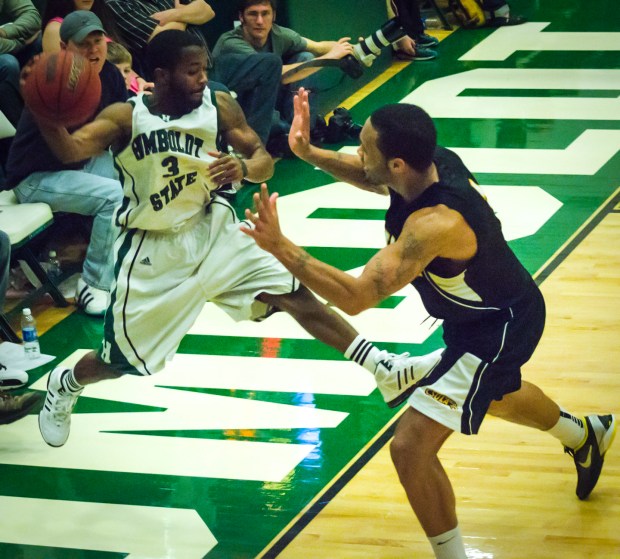 Cal Poly Humboldt's new men's basketball coach, D.J. Broome Jr.(3), saves an errant basketball from out of bounds in HSU men's basketball against CSU Los Angeles on Saturday, Feb. 11, 2012. (Photo by Mark Larson)