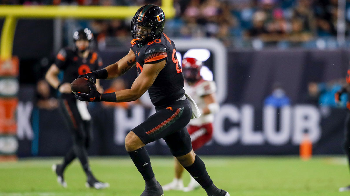 Miami Hurricanes tight end Elijah Arroyo (80) catches the football against the North Carolina State Wolfpack during the second half of the game at Hard Rock Stadium.