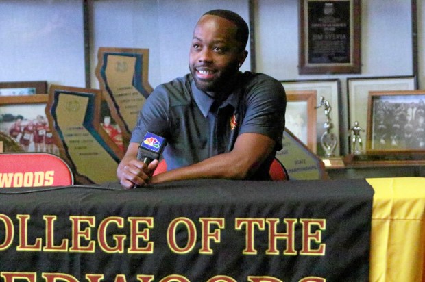 DJ Broome answers questions during his introductory press conference in 2014 as he was introduced as CR's new head coach. (Danny Penza/The Times-Standardfile photo)