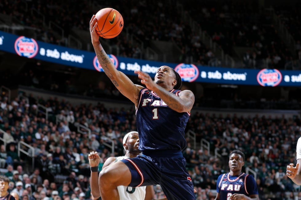 Florida Atlantic forward Kaleb Glenn (1) goes up for a layup against Michigan State during the...