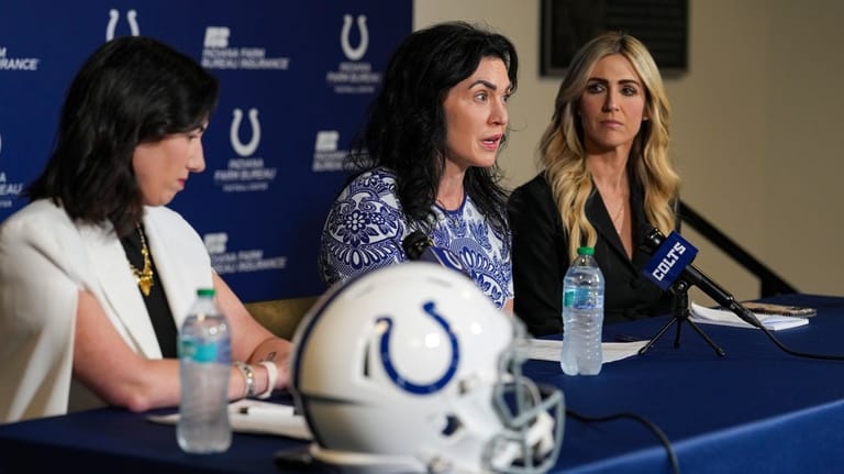 Indianapolis Colts owners Carlie-Irsay Gordon, center, is joined by her...
